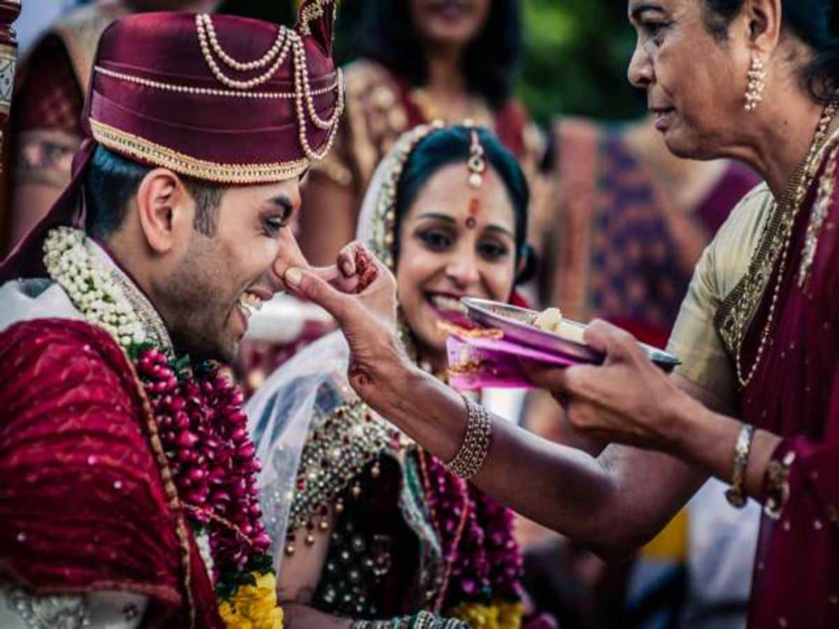 SHOWING THE IMAGE OF " ritual of pulling the groom's nose", ONE OF THE Shocking Indian Wedding Rituals